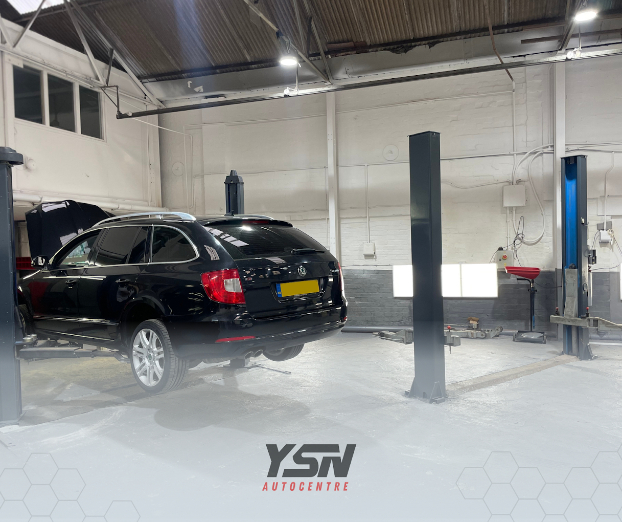 Suspension repair on a vehicle on the ramp at YSN Autocentre Smethwick